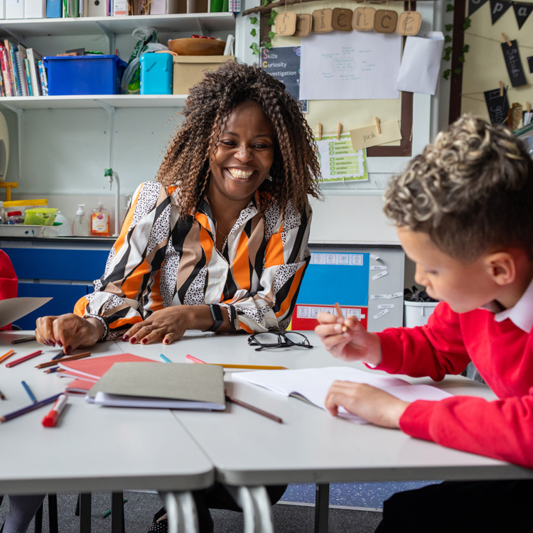 Black female teacher in class