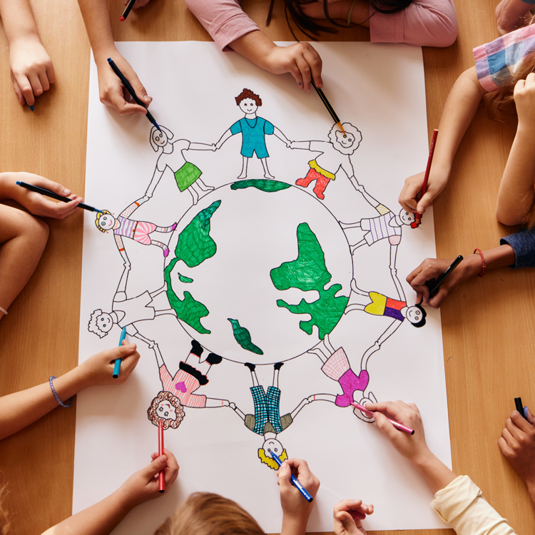 Children drawing children holding hands around the world