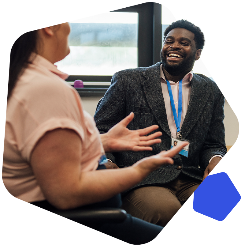 Male teacher laughing