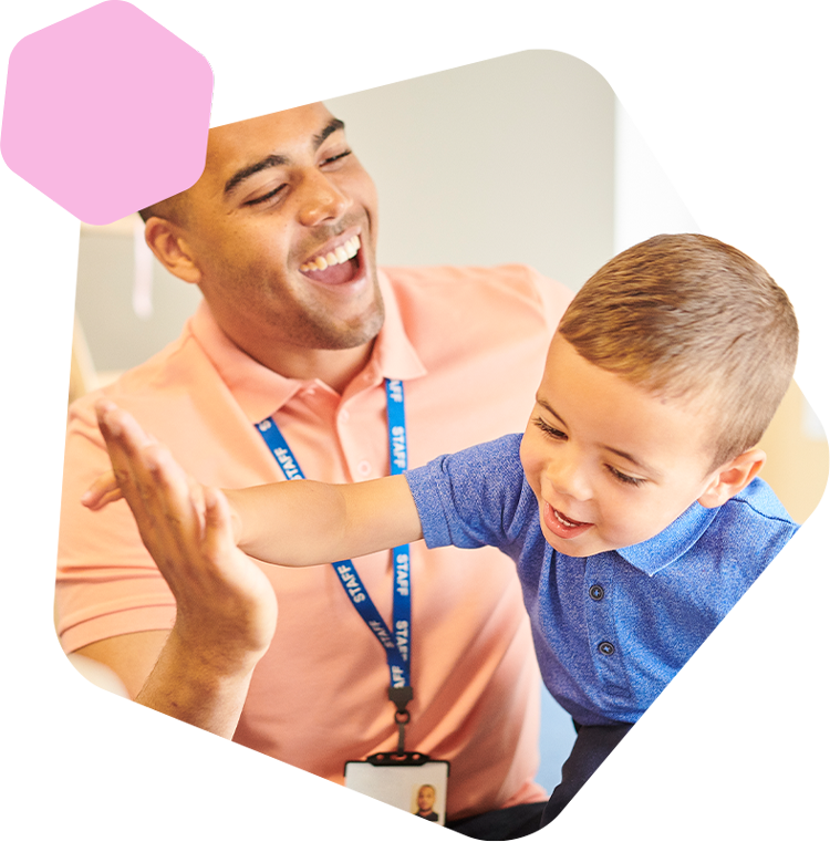 Male teacher with little boy