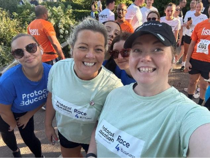 Protocol Education employees participating in a charity run
