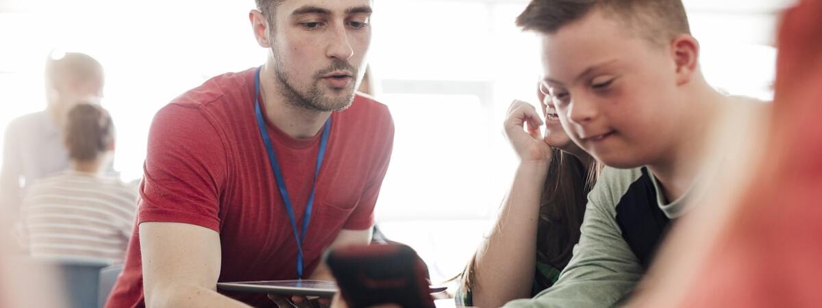 Sen Teacher With A Student In The Classroom